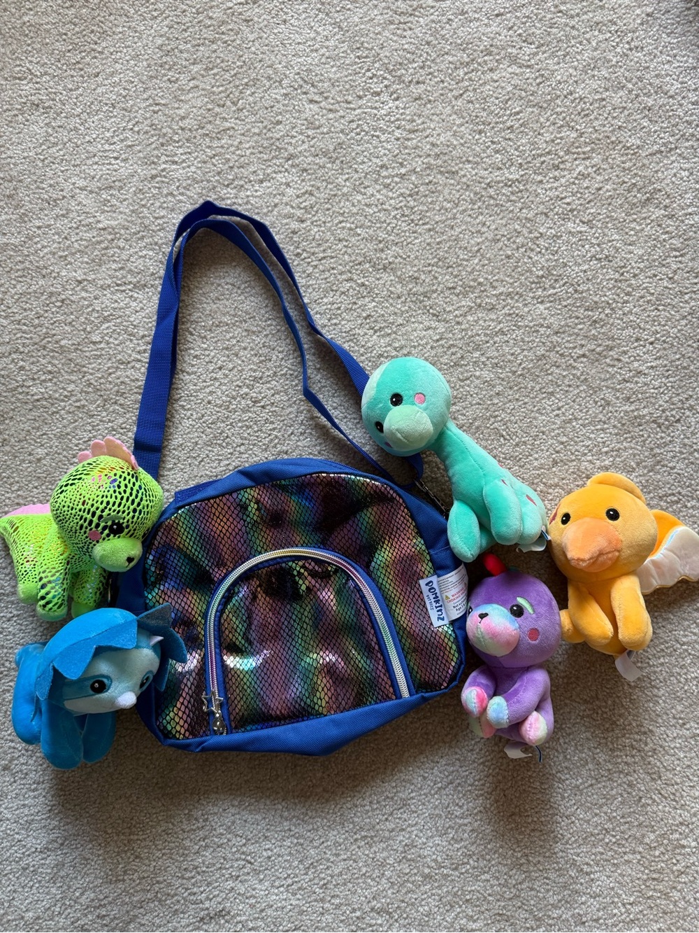 Pomkinz Pet Pals 5-Piece Plush Dinosaur Set with Blue Iridescent Bag